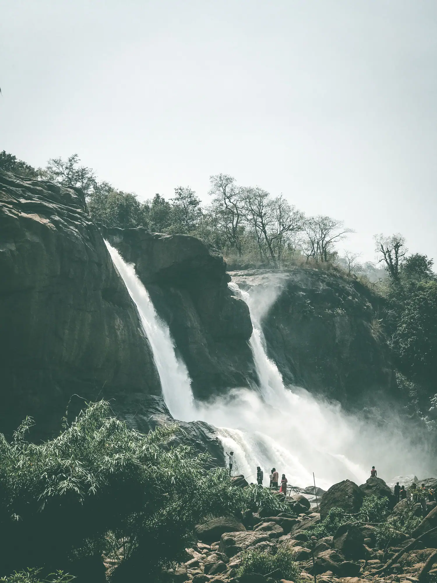 Twin-stream waterfall on a rocky cliff