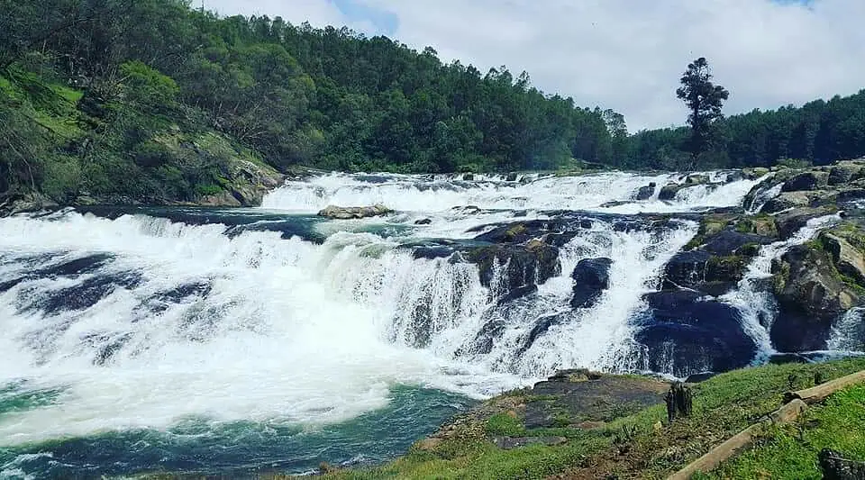 Pykara falls cascading over rocks near Ooty