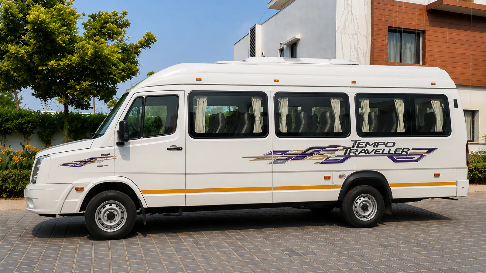 12-seater Tempo Traveller for group tours to Valparai